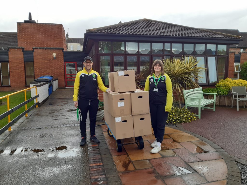 Norwich Football Club Staff Deliver Food To Vision Norfolk