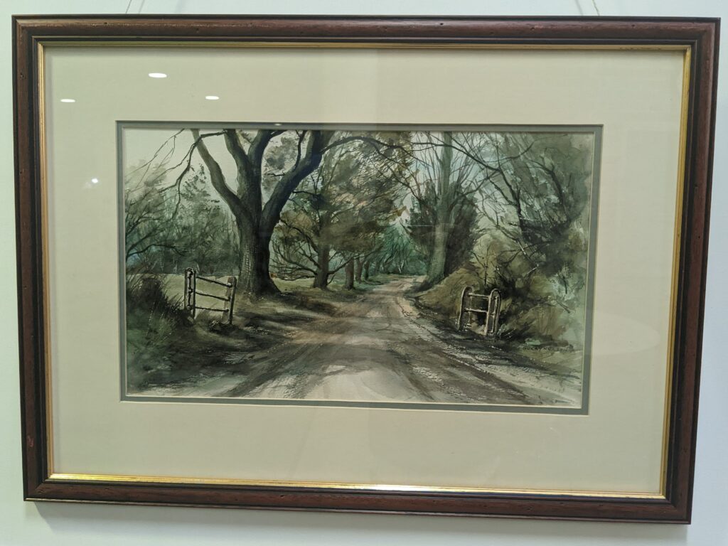 Painting of a wooded country lane
