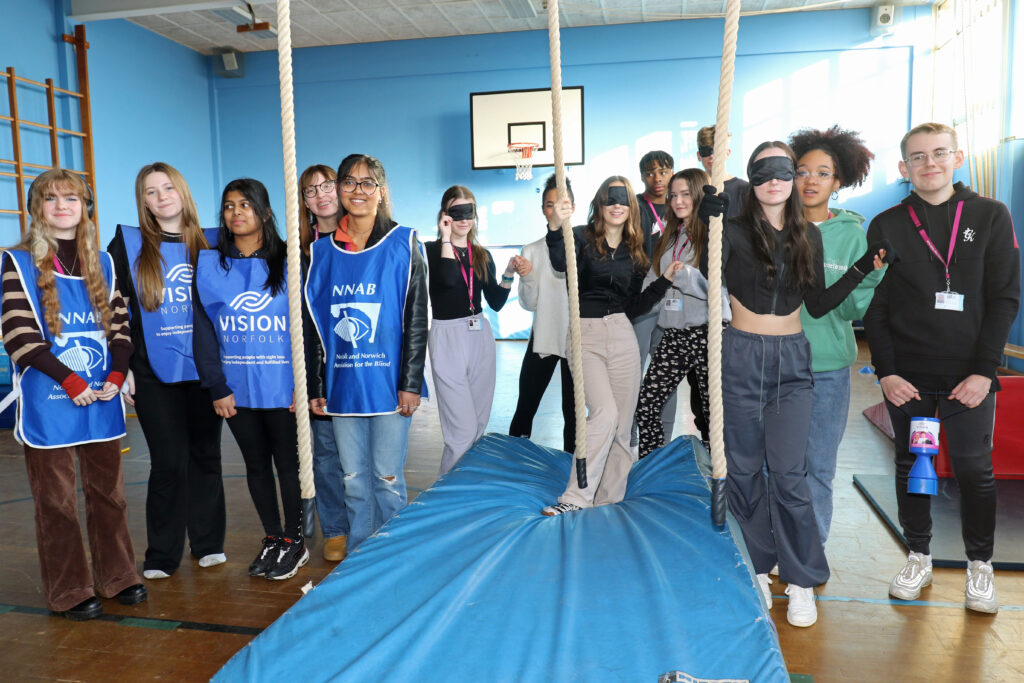 Students from Helelsdon High School undertaking a blindfold challenge to raise awareness of sight loss