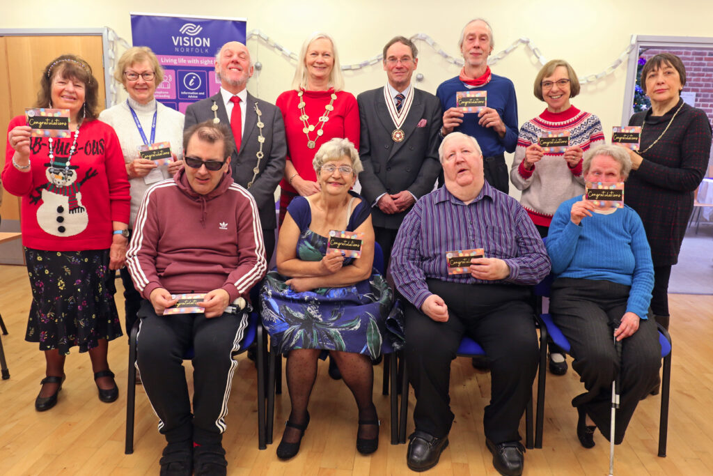 The group of volunteers are thanked at the celebration event in Norwich