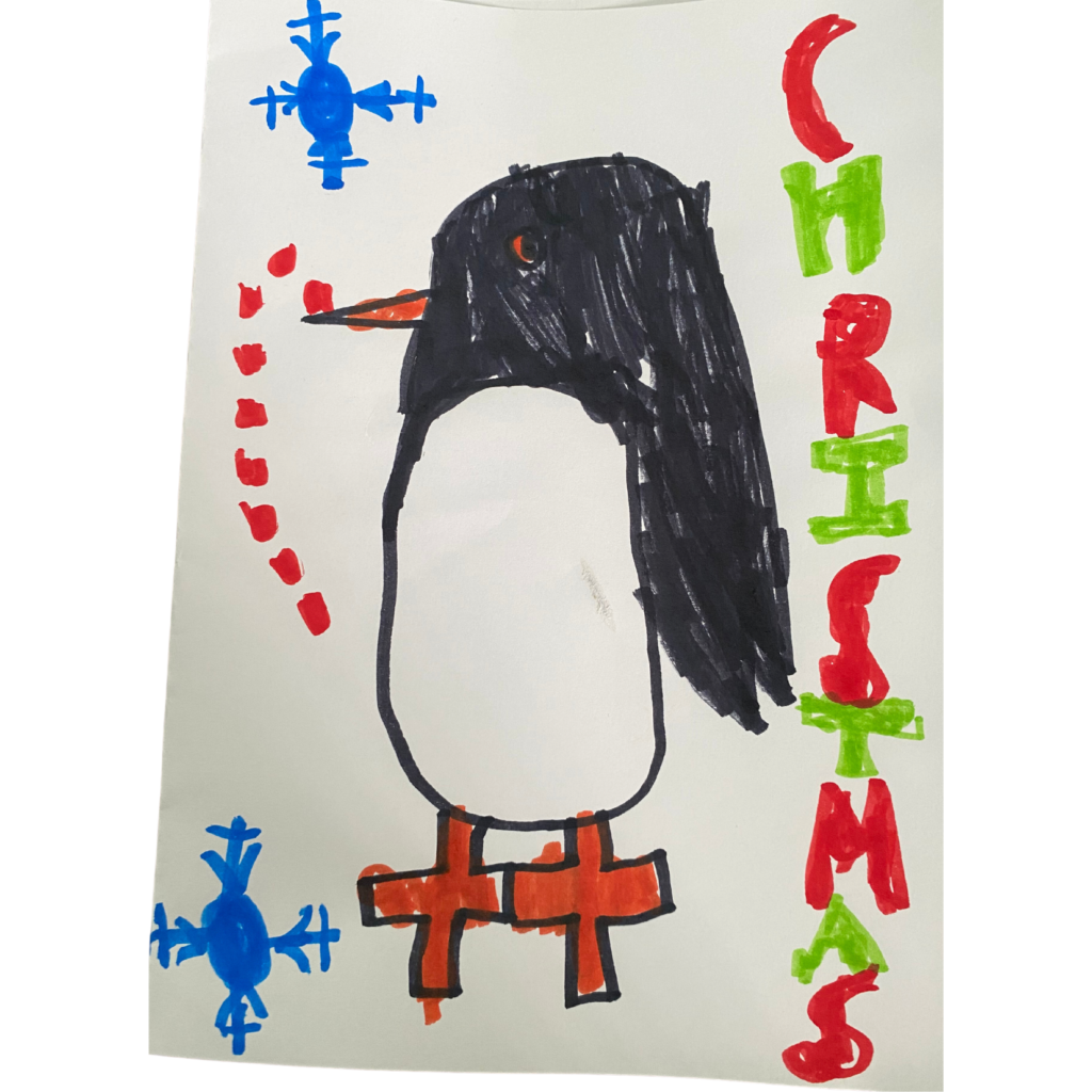 A penguin with an orange beak and feet drawn with marker on white paper. There are two snowflakes on the left and the word "Christmas" in red and green on the right.