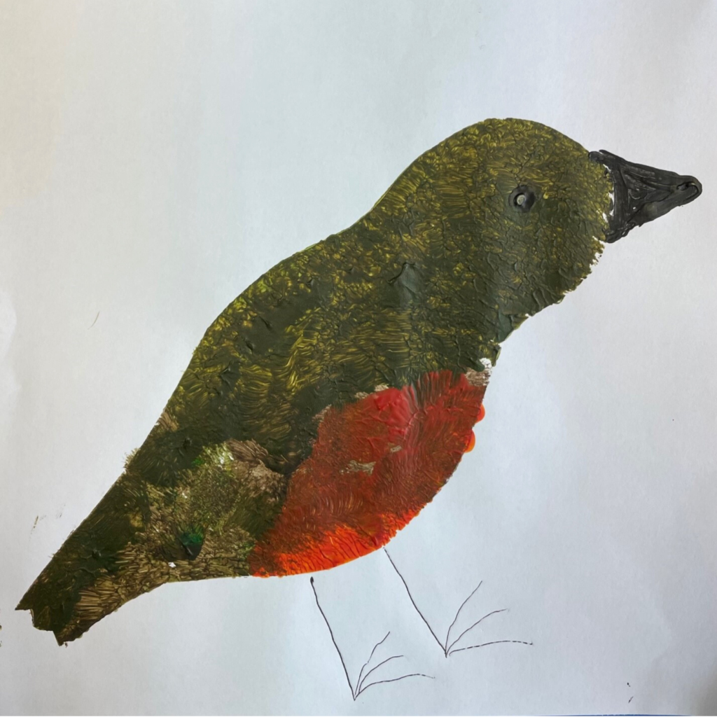 Brown and red robin painted on white paper. It has a black beak and eye and legs drawn on with pen.