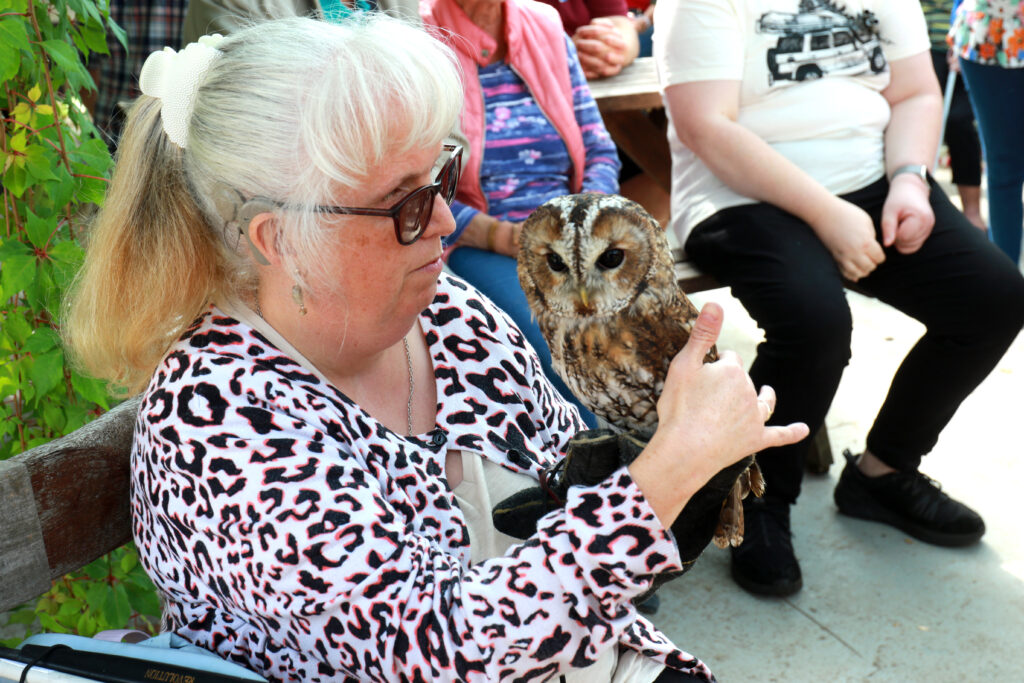 Kelci Batch holds a tawny owl