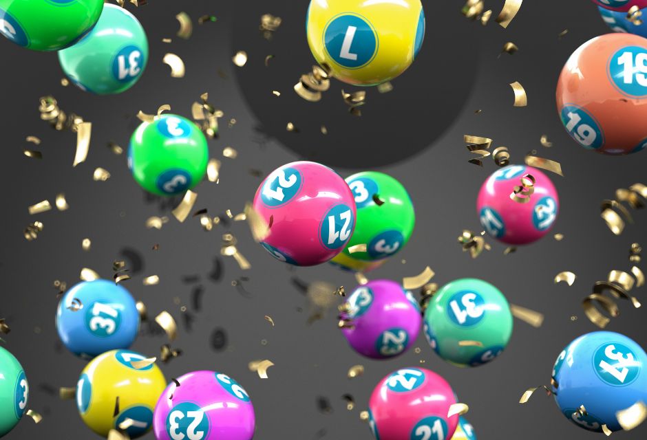 A stylised image of multicoloured lottery balls and gold confetti.