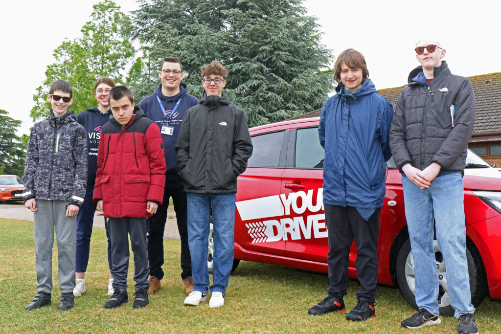 Some of the vision impaired youngsters who got behind the wheel at the Norfolk Showground