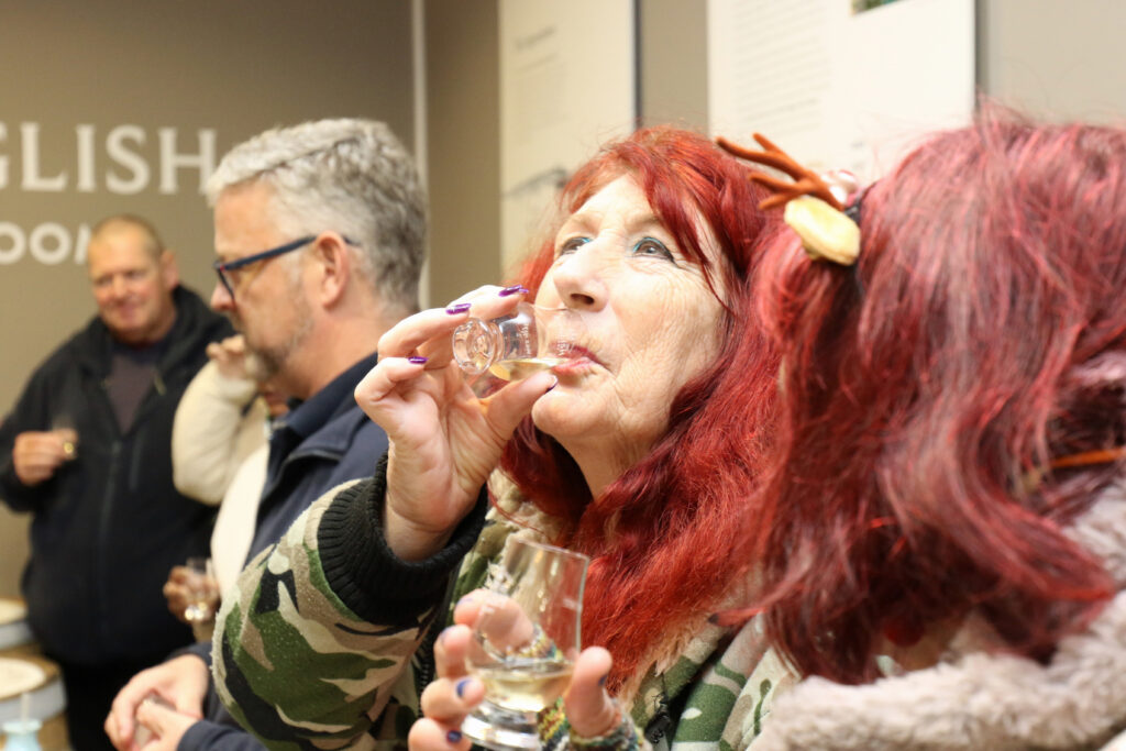 One of the group samples one of the award-winning whiskies